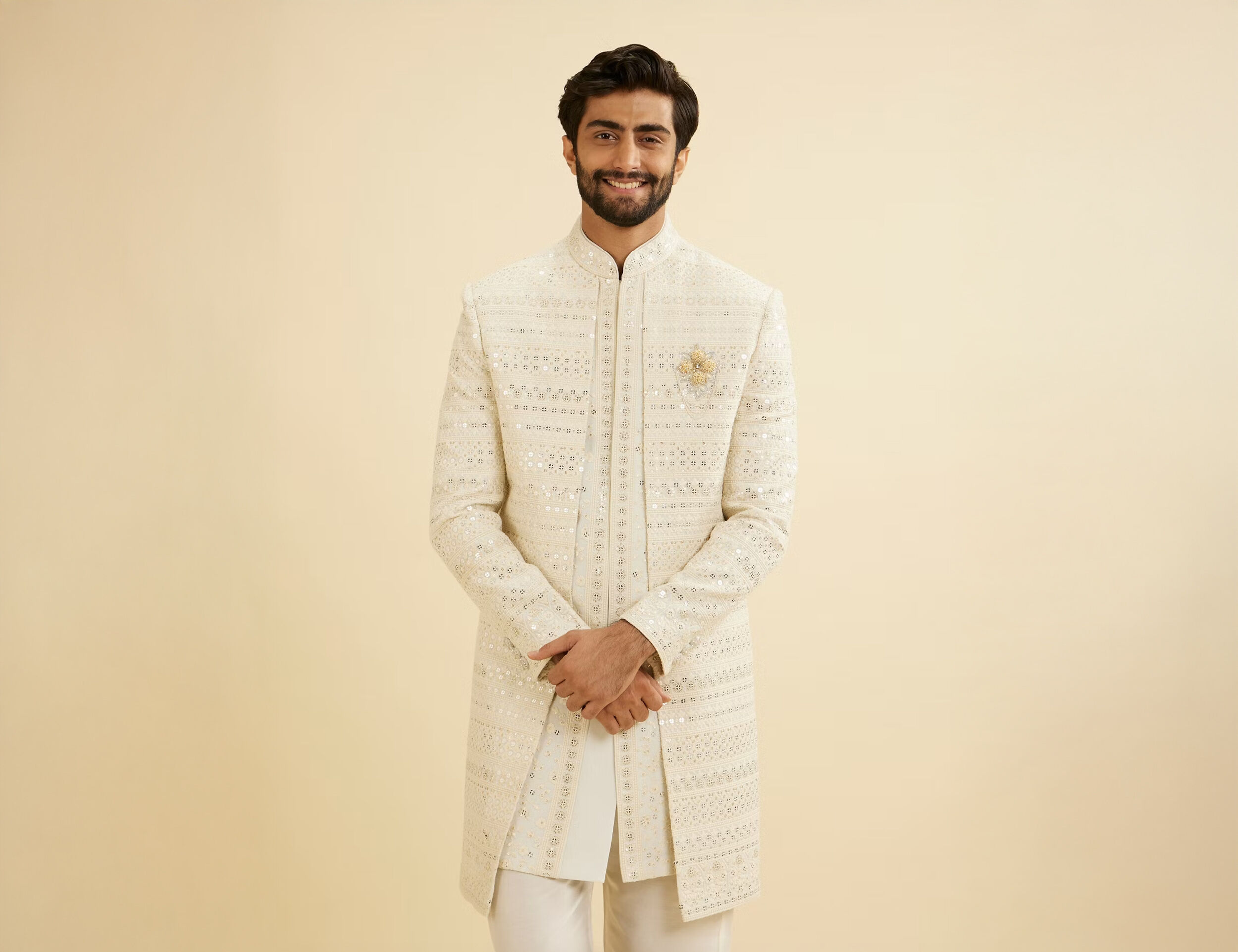 A groom wearing a chikankari sherwani